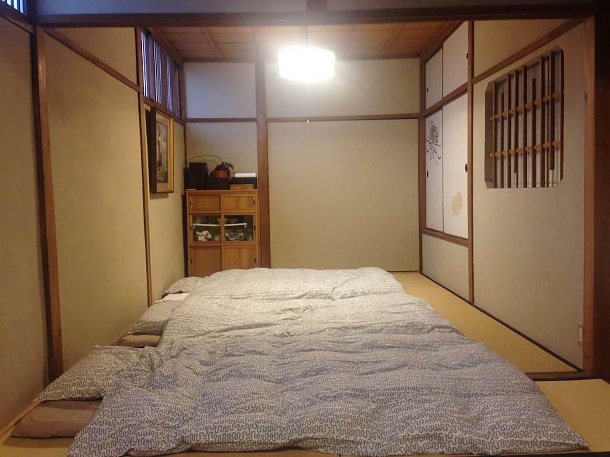 فندق أوساكافي  Bar併設の仕掛け満載忍者ハウス!Wi-Fi!天王寺電車で15分!帝塚山四丁目駅3メートル! المظهر الخارجي الصورة